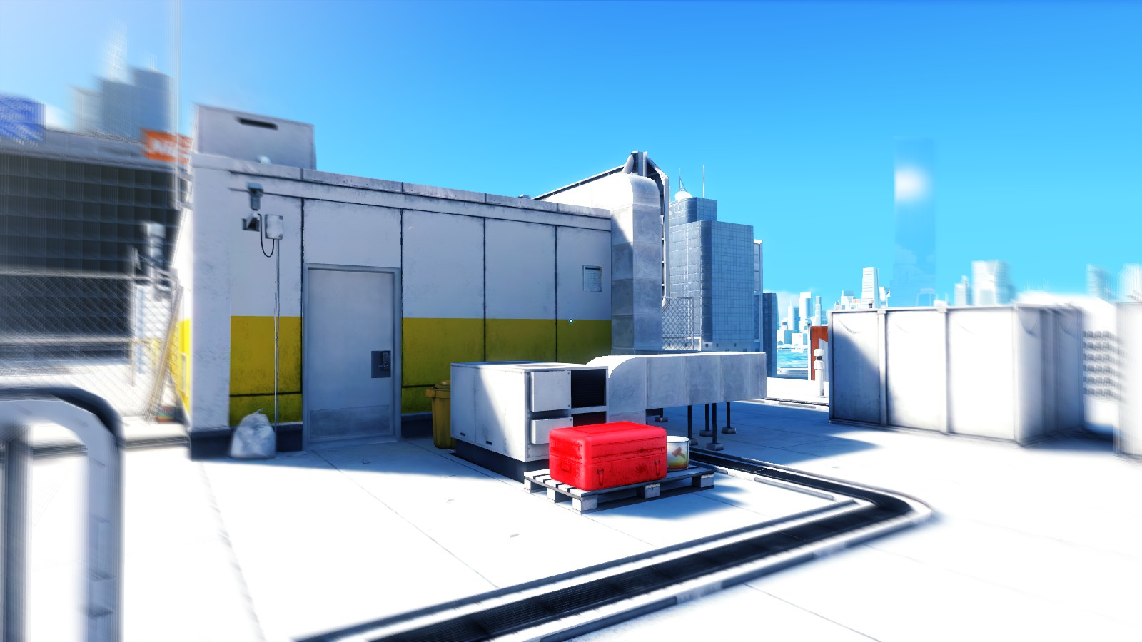 Various obstacles can be used to progress in Mirror's Edge, the path to take being clear to the player thanks to those obstacles being highlighted in red against the otherwise bright, but muted, cityscape backdrop.
