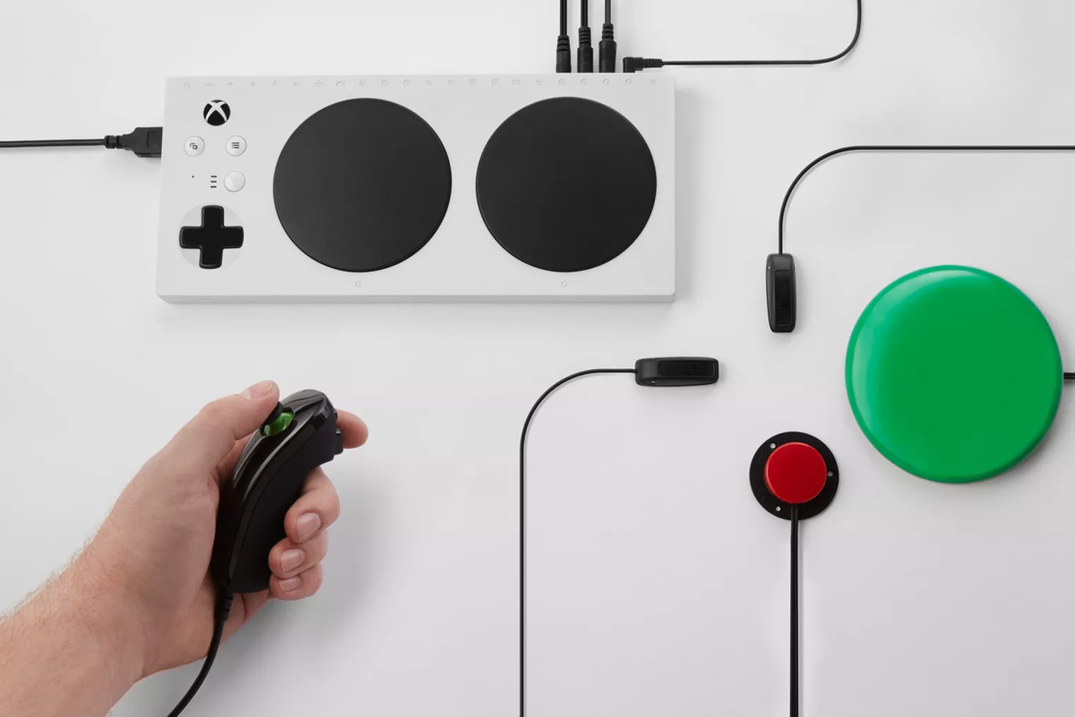 Xbox Adaptive Controller, connected to several other switches and controllers that are also supported as alernative input sources